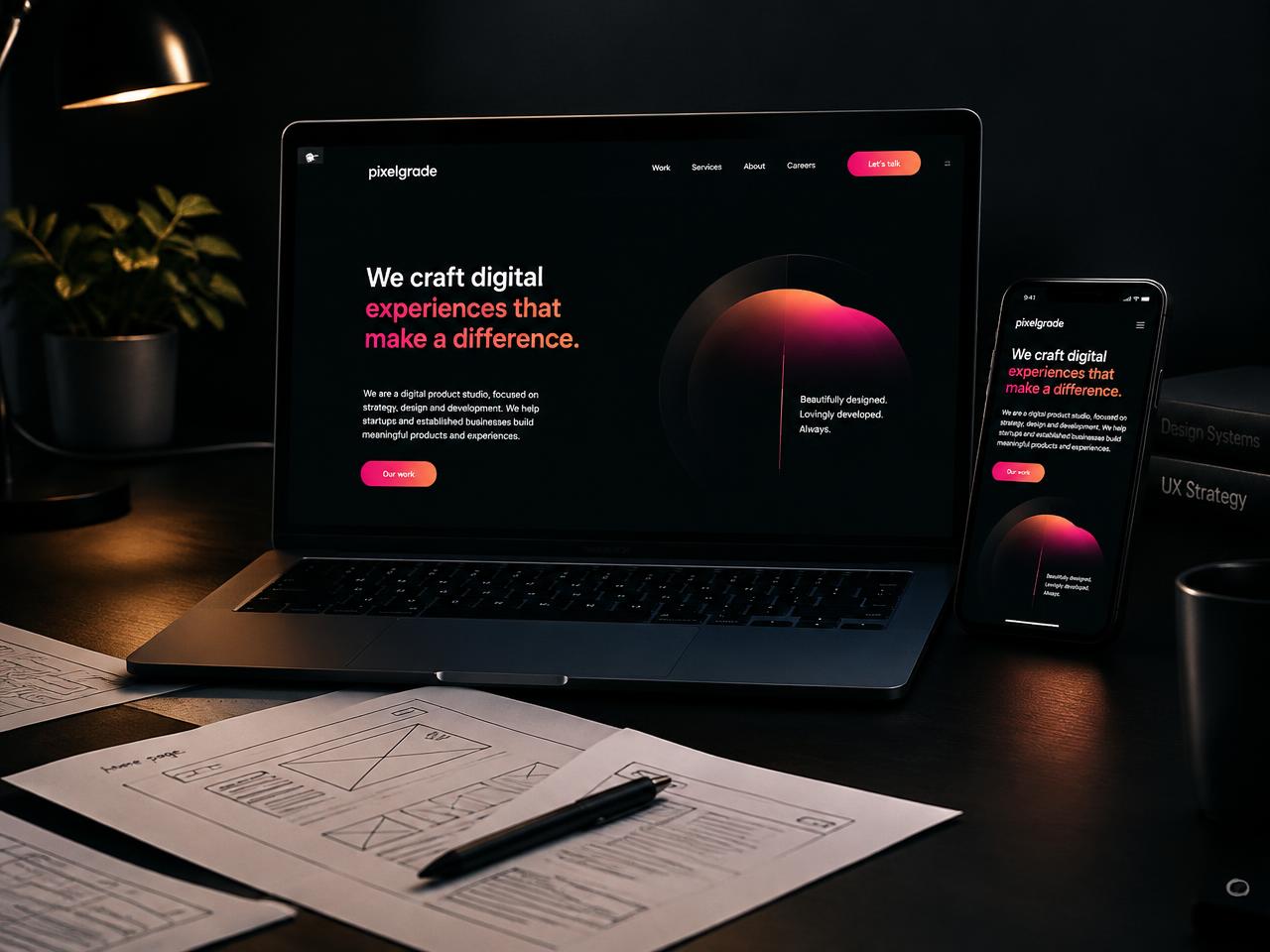 Custom responsive website design shown on a laptop and phone